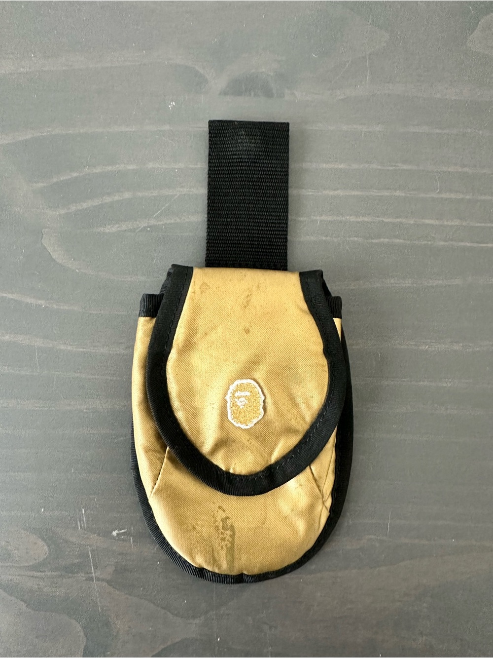 A Bathing Ape Canvas Utility Pouch in Gold with Black Trim